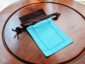 Hemstitch Sachet Bag. Aqua with Brown Top