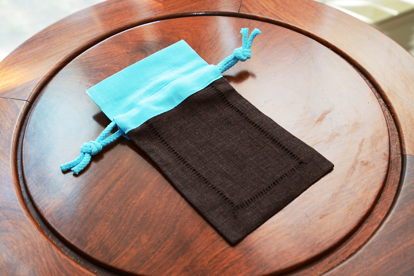 Hemstitch Sachet Bag. Brown with Aqua Blue Top